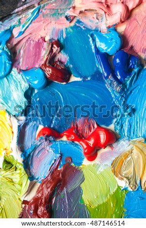 Oil paint a macro picture. Colored abstract background.