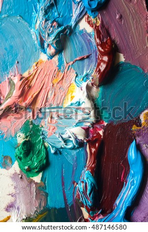 Oil paint a macro picture. Colored abstract background.