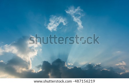 image of sun ray(beam) on blue sky day time for background usage.