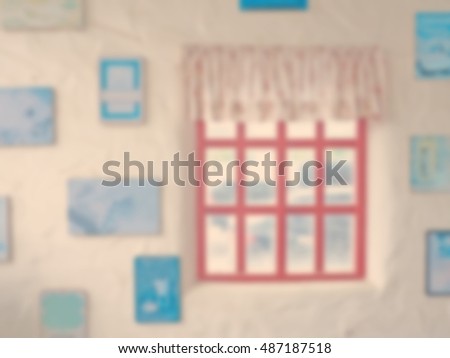 vintage red window with blue pictures