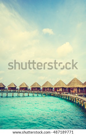 Beautiful tropical Maldives island with beach and sea for nature holiday vacation background concept - Vintage Filter and Boost up color Processing