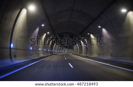 road tunnel, night illuminated Royalty-Free Stock Photo #487218493