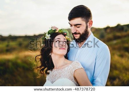 happy woman enjoying free time  with her husband  outdoors