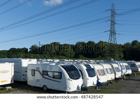 Caravans stored in rows on a sunny day. Royalty-Free Stock Photo #487428547