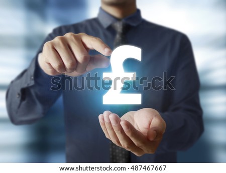 businessman with financial symbols coming from hand
