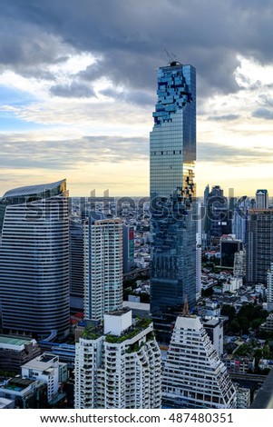 Cityscape from a high angle in Silom area, with Mahanakhon, which is a new building with a heighest in Thailand, Bangkok, Thailand, Sunset sky
