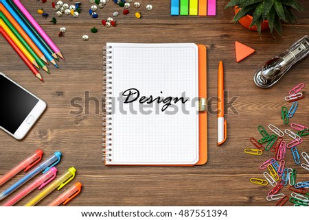 Title design and Business (school) accessories (notebook, diary, mobile phone, cactus, pens, pencils) on a wooden table. Top view.