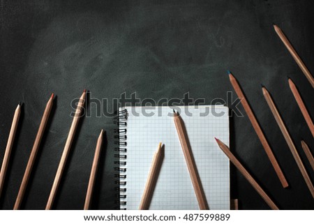  book and two pencils