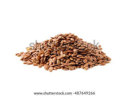 Flax seeds heap isolated on white Royalty-Free Stock Photo #487649266