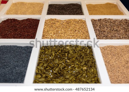 Seeds Assortments inside White Squared Compartment, Food Theme