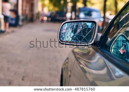 Car with broken side door mirror Royalty-Free Stock Photo #487815760