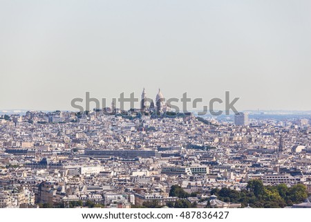 View of Cityscape of Paris in direction of Basilica of the Sacred Heart on the summit of the butte Montmartre from Eiffel tower, Paris, France