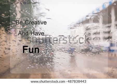 Word Be Creative And Have Fun on raindrop on the glass background