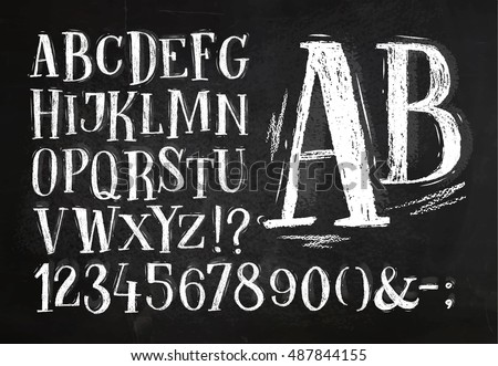 Font pencil vintage alphabet drawing with chalk on chalkboard background. Royalty-Free Stock Photo #487844155