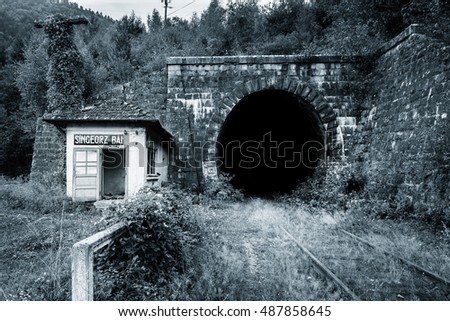 Abandoned rail way tunnel in Singeorz-Bai, Romania.
Text on plate: place name in Romania. No translate.