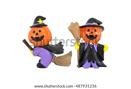 Doll witch pumpkin for Halloween decoration festival isolated white background.