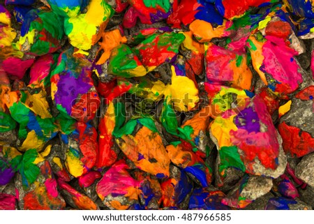 Pebbles painted bright colored paint