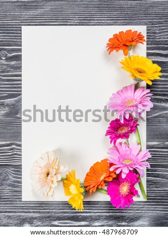 Postcard with empty paper sheet and flowers, floral background for holiday greetings