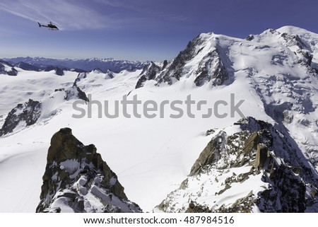 Mont Blanc, Chamonix, French Alps. France. - tourists climbing up the mountain