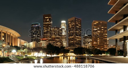 Los Angeles downtown at night with urban buildings and lake