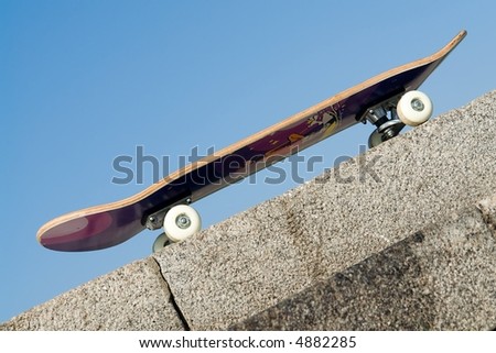 Skate board with blue sky at background
