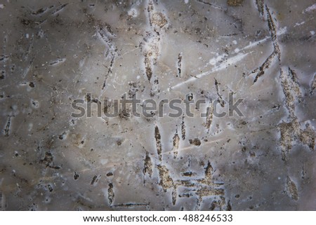 Stone abstract background with a pattern caused by water erosion