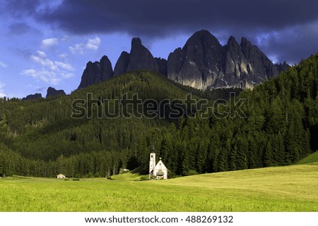 Santa Maddalena church in green alpine valley, Val di Funes, Dolomiti Mountains, Italy