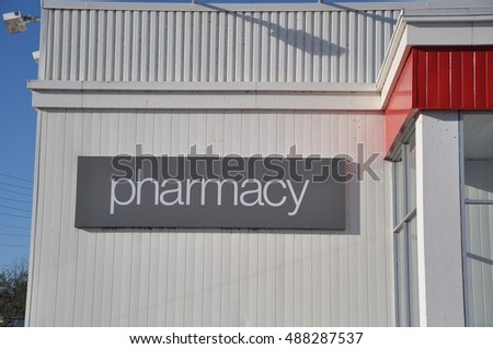 Pharmacy sign at storefront