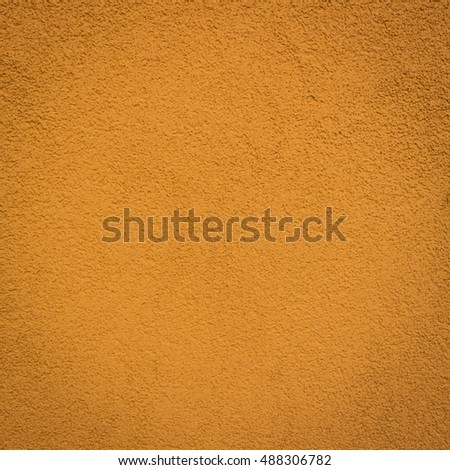 wall color bronze background and texture with vignetting and blank copyspace for text or advertising.