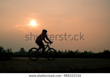 silhouette bike on sunset and bicycle background
