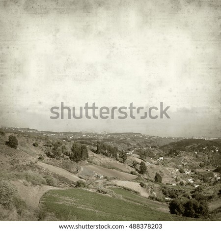 textured old paper background with landscape of Central Gran Canaria