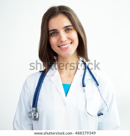 Portrait of happy successful female doctor