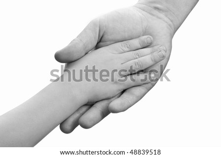 Children's hand in a man's palm on a white background
