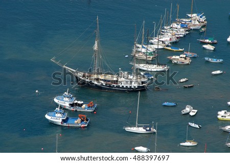 Aerial photo of different boats moored in the port of Los Cristianos, in the south of Tenerife, Canary Islands
