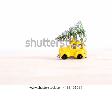car driven by the Christmas tree for the New Year