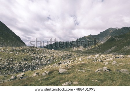 Beautiful rocky view in Fagaras mountains in Southern Carpathians, Romania - vintage film look