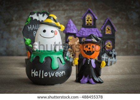 Halloween cartoon set on wooden background.