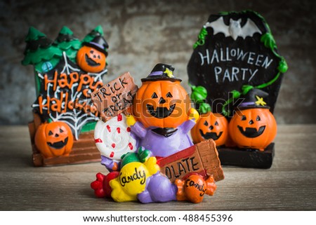 Halloween cartoon set on wooden background.