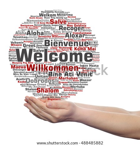 Concept abstract welcome or greeting international word cloud in hand, different languages or multilingual isolated metaphor to world, foreign, worldwide, travel, translate, vacation or tourism