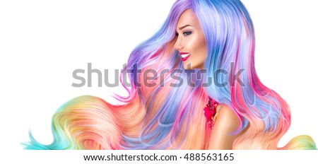 Beauty Fashion Model Girl with Colorful Dyed Hair. Colourful Long Hair. Portrait of a Beautiful Woman with Colorful Dyed Hair, professional hair Coloring. Colouring rainbow hair, curly long haircut Royalty-Free Stock Photo #488563165