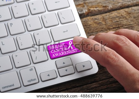 Hand On Keyboard with Word "Breast Cancer Awareness"