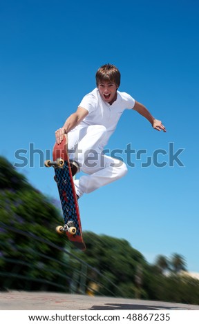 Skateboarder on a high jump Royalty-Free Stock Photo #48867235