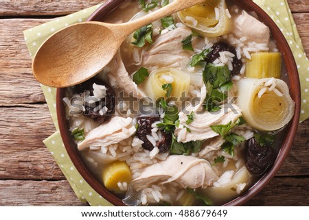 Scottish cock-a-leekie soup with leeks and prunes close up in a bowl on the table. horizontal view from above
 Royalty-Free Stock Photo #488679649