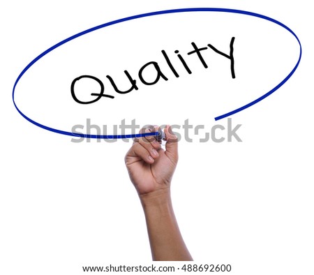 asia man hand writing quality with black marker for business concept isolated on white