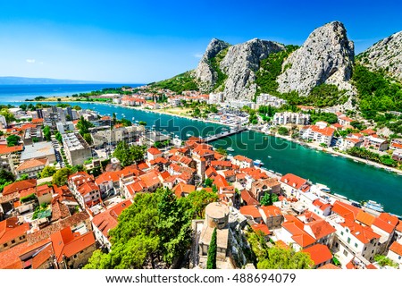 Omis, Croatia. Dalmatia Coast panorama with emerald-green Cetina River, Croatian travel landmark at Adriatic Sea. Royalty-Free Stock Photo #488694079