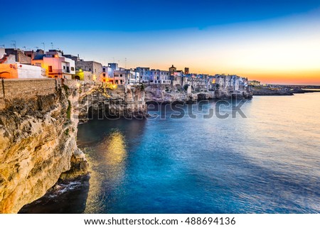 Puglia, Italy. Sunset scenery of Polignano a Mare, town in the province of Bari, Apulia, southern Italia on the Adriatic Sea Royalty-Free Stock Photo #488694136