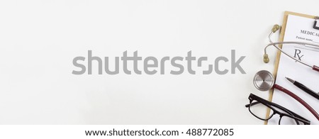 prescription, sterile doctors office desk. Medical accessories on a white background with copy space around products.hospital workplace. Stethoscope, clip board, glasses and other things,banner