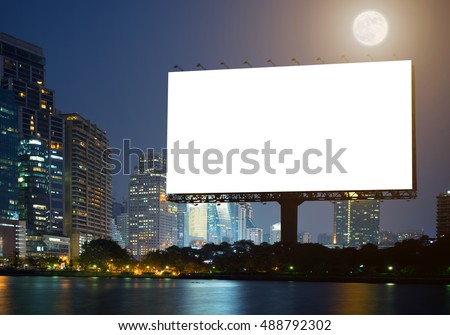 Blank template  for outdoor advertising or Blank billboard with a background of city. With clipping path on screen - can be used for trade shows, and advertising or promotional poster.