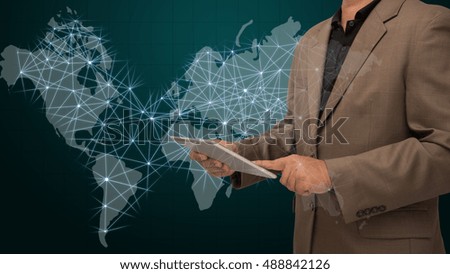 business man using tablet with visual world map screen background , business concept