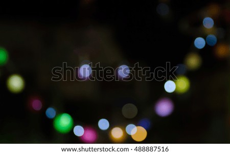 Abstract blurred background, party night with colorful light balls bokeh.